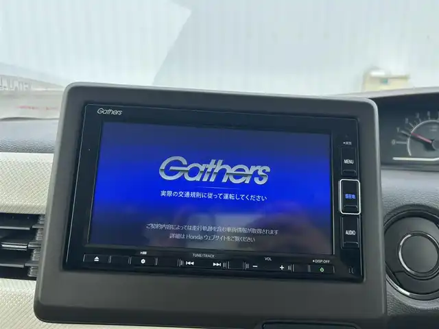 ホンダ Ｎ ＢＯＸ L ターボ 愛媛県 2023(令5)年 1.5万km プラチナホワイトパール 純正ナビ（SD/DVD/バックカメラ/Bluetooth）/純正アルミホイール14/純正フロアマット/両側パワースライドドア/ABS/横滑り防止装置/コーナーセンサー/レーンアシスト/オートライト/衝突被害軽減システム/ダブル＋サイドエアバック/カーテンエアバック/ETC/LEDライト