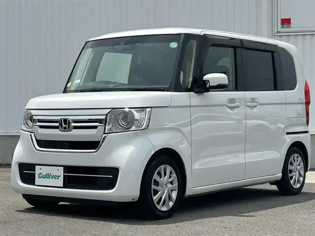 ホンダ Ｎ ＢＯＸ L ターボ 愛媛県 2023(令5)年 1.5万km プラチナホワイトパール 純正ナビ（SD/DVD/バックカメラ/Bluetooth）/純正アルミホイール14/純正フロアマット/両側パワースライドドア/ABS/横滑り防止装置/コーナーセンサー/レーンアシスト/オートライト/衝突被害軽減システム/ダブル＋サイドエアバック/カーテンエアバック/ETC/LEDライト