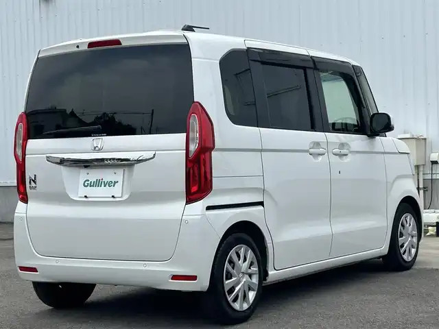 ホンダ Ｎ ＢＯＸ L ターボ 愛媛県 2023(令5)年 1.5万km プラチナホワイトパール 純正ナビ（SD/DVD/バックカメラ/Bluetooth）/純正アルミホイール14/純正フロアマット/両側パワースライドドア/ABS/横滑り防止装置/コーナーセンサー/レーンアシスト/オートライト/衝突被害軽減システム/ダブル＋サイドエアバック/カーテンエアバック/ETC/LEDライト