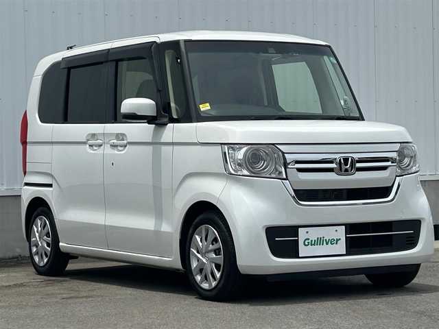 ホンダ Ｎ ＢＯＸ L ターボ 愛媛県 2023(令5)年 1.5万km プラチナホワイトパール 純正ナビ（Bluetooth/SD/CD/DVD/フルセグTV)/バックカメラ/前後ドライブレコーダー/両側パワースライドドア/ETC/Honda SENSING/衝突軽減ブレーキ（CMBS）/誤発進抑制機能/歩行者事故低減ステアリング/路外逸脱抑制機能/渋滞追従機能付アダプティブクルーズコントロール（ACC）/車線維持支援システム（LKAS）/先行車発進お知らせ機能/標識認識機能/後方誤発進抑制機能/LEDヘッドライト/オートマチックハイビーム/純正フロアマット/プッシュスタート/スマートキー
