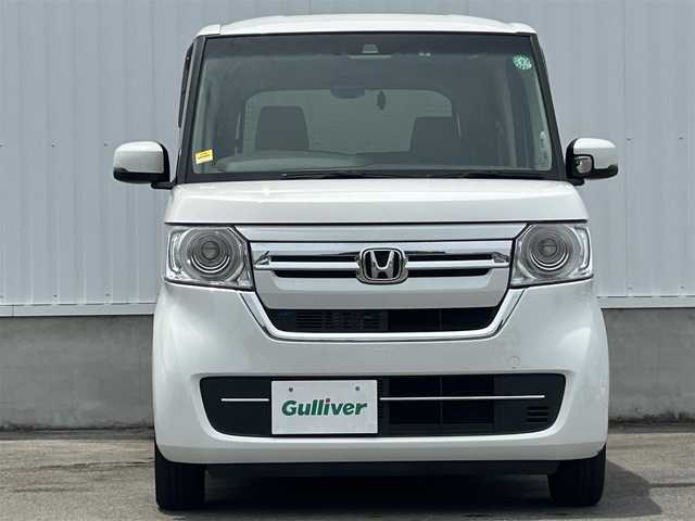 ホンダ Ｎ ＢＯＸ L ターボ 愛媛県 2023(令5)年 1.5万km プラチナホワイトパール 純正ナビ（Bluetooth/SD/CD/DVD/フルセグTV)/バックカメラ/前後ドライブレコーダー/両側パワースライドドア/ETC/Honda SENSING/衝突軽減ブレーキ（CMBS）/誤発進抑制機能/歩行者事故低減ステアリング/路外逸脱抑制機能/渋滞追従機能付アダプティブクルーズコントロール（ACC）/車線維持支援システム（LKAS）/先行車発進お知らせ機能/標識認識機能/後方誤発進抑制機能/LEDヘッドライト/オートマチックハイビーム/純正フロアマット/プッシュスタート/スマートキー