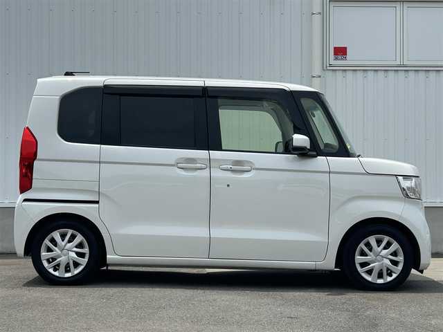 ホンダ Ｎ ＢＯＸ L ターボ 愛媛県 2023(令5)年 1.5万km プラチナホワイトパール 純正ナビ（Bluetooth/SD/CD/DVD/フルセグTV)/バックカメラ/前後ドライブレコーダー/両側パワースライドドア/ETC/Honda SENSING/衝突軽減ブレーキ（CMBS）/誤発進抑制機能/歩行者事故低減ステアリング/路外逸脱抑制機能/渋滞追従機能付アダプティブクルーズコントロール（ACC）/車線維持支援システム（LKAS）/先行車発進お知らせ機能/標識認識機能/後方誤発進抑制機能/LEDヘッドライト/オートマチックハイビーム/純正フロアマット/プッシュスタート/スマートキー
