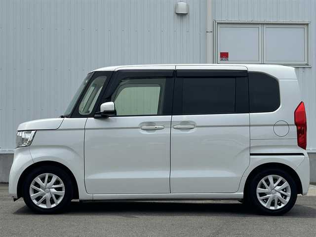 ホンダ Ｎ ＢＯＸ L ターボ 愛媛県 2023(令5)年 1.5万km プラチナホワイトパール 純正ナビ（Bluetooth/SD/CD/DVD/フルセグTV)/バックカメラ/前後ドライブレコーダー/両側パワースライドドア/ETC/Honda SENSING/衝突軽減ブレーキ（CMBS）/誤発進抑制機能/歩行者事故低減ステアリング/路外逸脱抑制機能/渋滞追従機能付アダプティブクルーズコントロール（ACC）/車線維持支援システム（LKAS）/先行車発進お知らせ機能/標識認識機能/後方誤発進抑制機能/LEDヘッドライト/オートマチックハイビーム/純正フロアマット/プッシュスタート/スマートキー