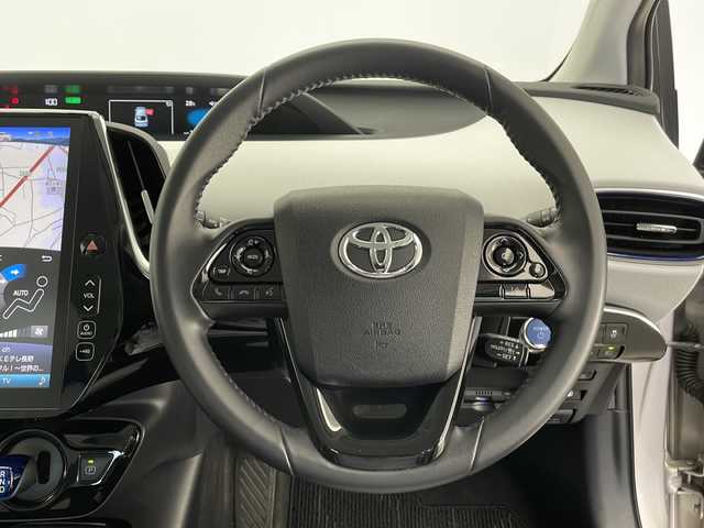 トヨタ プリウス A プレミアム　ツーリングセレ 長野県 2019(令1)年 6.7万km スティールブロンドM 4WD/JBLプレミアムサウンド/純正メモリナビ&フルセグTV&USB&BT/トヨタセーフティセンス/アダプティブクルーズコントロール/レーンディパーチャーアラート/プリクラッシュセーフティ/クリアランスソナー/ヘッドアップディスプレイ/ブラインドスポットモニター/オートマチックハイビーム/社外前後ドライブレコーダー/前席エアシート/前席シートヒーター/運転席パワーシート/ステアリングスイッチ/全方位カメラ/ビルトインETC2.0/LEDヘッドライト/オートライト/電動格納ミラー/ウィンカーミラー/純正17インチAW装着/純正フロアマット/プッシュスタート/スマートキー