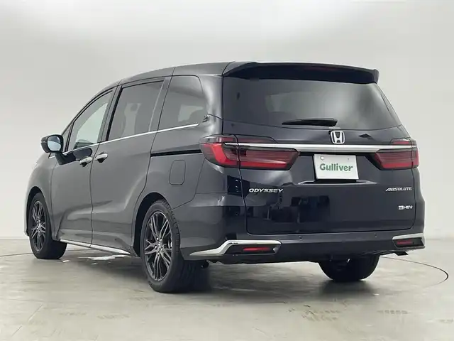 ホンダ オデッセイ ハイブリッド e:HEVアブソルート EX 群馬県 2024(令6)年 2.4万km プレミアムヴィーナスブラックP 純正フリップダウンモニター/純正11.4インチナビ/・AM/FM/CD/DVD/HDMI/iPod/フルセグTV/・AppleCarPlay/AndroidAuto/Bluetooth/マルチビューカメラシステム/ホンダセンシング/・衝突軽減ブレーキ（CMBS）/・先行車発進お知らせ機能/・歩行者事故低減ステアリング/・路外逸脱抑制機能/・標識認識機能/・渋滞追従機能付アダプティブクルーズコントロール（ACC）/・車線維持支援システム（LKAS）/・ブラインドスポットインフォメーション/・オートハイビーム/・誤発進抑制機能/・後方誤発進抑制機能/・近距離衝突軽減ブレーキ/・急アクセル抑制機能/・パーキングセンサーシステム/・後退出庫サポート/Honda CONNECT for Gathers+ナビ装着用スペシャルパッケージ/2列目両側アームレスト付４ウェイパワーシート/2列目使途センターテーブル/運転席・助手席パワーシート/運転席・助手席シートヒーター+２列目シートヒーター/ハンズフリーアクセスパワーテールゲート/本革シート/センターコンソールボックス+ワイヤレスチャージャー/ETC2.0/純正前後ドライブレコーダー【DRH-224SD】