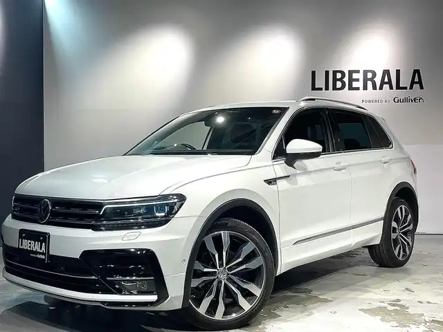 フォルクスワーゲン ティグアン TDI 4モーション Rライン 道央・札幌 2018(平30)年 6.6万km ピュアホワイト スマート＆エントリーシステム/カミングホーム＆リービングホーム/インテリアアンビエントライト/シートバックテーブル/Volkswagen純正インフォテイメントシステム/モバイルオンラインサービス/チルト＆テレスコピックステアリング/電動パワーステアリング/パワーシート（D/N）/シートヒーター（D/ N）/レザーシフトノブ/電動格納式サイドミラー/アレルゲン除去機能付きフレッシュエアフィルター/エレクトロニックパーキングブレーキ/分離可倒式シート/パワーテールゲート/ビルトインETC