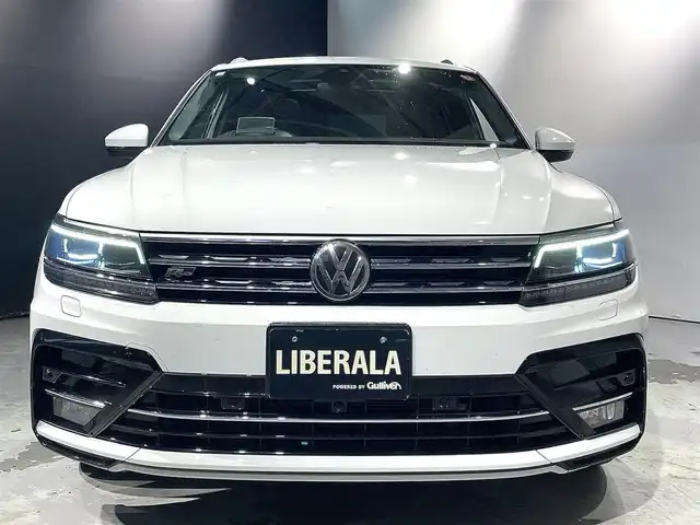 フォルクスワーゲン ティグアン TDI 4モーション Rライン 道央・札幌 2018(平30)年 6.6万km ピュアホワイト スマート＆エントリーシステム/カミングホーム＆リービングホーム/インテリアアンビエントライト/シートバックテーブル/Volkswagen純正インフォテイメントシステム/モバイルオンラインサービス/チルト＆テレスコピックステアリング/電動パワーステアリング/パワーシート（D/N）/シートヒーター（D/ N）/レザーシフトノブ/電動格納式サイドミラー/アレルゲン除去機能付きフレッシュエアフィルター/エレクトロニックパーキングブレーキ/分離可倒式シート/パワーテールゲート/ビルトインETC