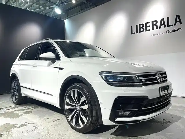 フォルクスワーゲン ティグアン TDI 4モーション Rライン 道央・札幌 2018(平30)年 6.6万km ピュアホワイト スマート＆エントリーシステム/カミングホーム＆リービングホーム/インテリアアンビエントライト/シートバックテーブル/Volkswagen純正インフォテイメントシステム/モバイルオンラインサービス/チルト＆テレスコピックステアリング/電動パワーステアリング/パワーシート（D/N）/シートヒーター（D/ N）/レザーシフトノブ/電動格納式サイドミラー/アレルゲン除去機能付きフレッシュエアフィルター/エレクトロニックパーキングブレーキ/分離可倒式シート/パワーテールゲート/ビルトインETC