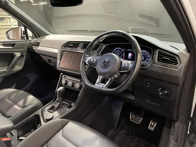 フォルクスワーゲン ティグアン TDI 4モーション Rライン 道央・札幌 2018(平30)年 6.6万km ピュアホワイト スマート＆エントリーシステム/カミングホーム＆リービングホーム/インテリアアンビエントライト/シートバックテーブル/Volkswagen純正インフォテイメントシステム/モバイルオンラインサービス/チルト＆テレスコピックステアリング/電動パワーステアリング/パワーシート（D/N）/シートヒーター（D/ N）/レザーシフトノブ/電動格納式サイドミラー/アレルゲン除去機能付きフレッシュエアフィルター/エレクトロニックパーキングブレーキ/分離可倒式シート/パワーテールゲート/ビルトインETC