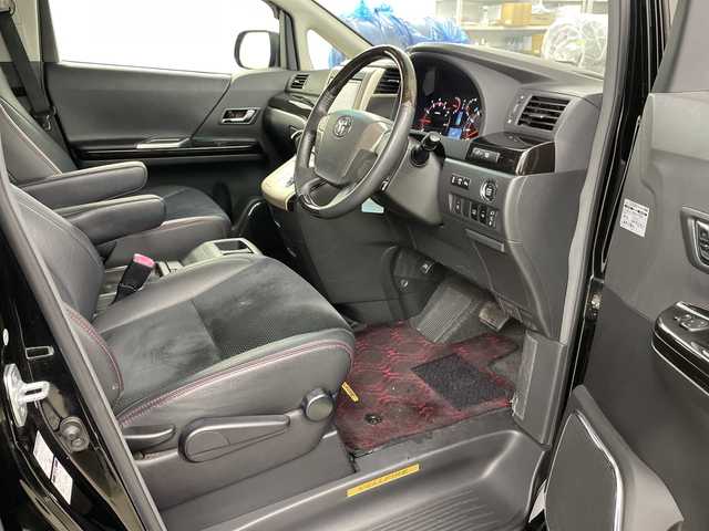 トヨタ ヴェルファイア 2．4Z ゴールデンアイズ 道央・札幌 2012(平24)年 9.9万km ブラック ・４WD　/寒冷地仕様/・純正HDDディーラーOPナビ/・DVD.CD.HDD.Bluetooth/・フルセグ.SD.バックカメラ/・純正フリップダウンモニター/・2列目オットマンシート/・両側パワースライドドア/・パワースライドドア/・HIDライト/オートライト/・ウッドコンビハンドル/・ハーフレザーシート/・スマートキー/・スタッドレスタイヤ積込み