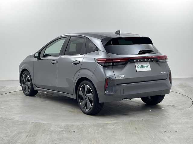 日産 オーラ G 栃木県 2022(令4)年 3.4万km ダークメタルグレー 純正ナビ/（BT/フルセグ/AppleCarPlay/Android Auto)/BOSEサウンド/全周囲カメラ/衝突軽減システム/レーダークルーズコントロール/車線逸脱抑制機能/後退時車両検知/パーキングサポートセンサー/横滑り防止/標識認識機能/電動格納ミラー/ワイヤレス充電/ETC2.0/ドライブレコーダー/純正アルミホイール/純正フロアマット/プッシュスタート/スマートキー