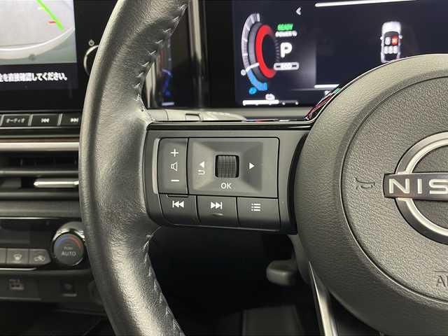 日産 オーラ G 栃木県 2022(令4)年 3.4万km ダークメタルグレー 純正ナビ/（BT/フルセグ/AppleCarPlay/Android Auto)/BOSEサウンド/全周囲カメラ/衝突軽減システム/レーダークルーズコントロール/車線逸脱抑制機能/後退時車両検知/パーキングサポートセンサー/横滑り防止/標識認識機能/電動格納ミラー/ワイヤレス充電/ETC2.0/ドライブレコーダー/純正アルミホイール/純正フロアマット/プッシュスタート/スマートキー