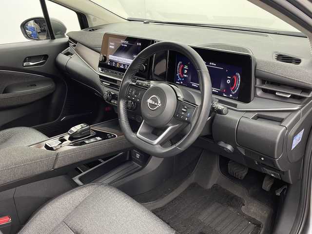 日産 オーラ G 栃木県 2022(令4)年 3.4万km ダークメタルグレー 純正ナビ/（BT/フルセグ/AppleCarPlay/Android Auto)/BOSEサウンド/全周囲カメラ/衝突軽減システム/レーダークルーズコントロール/車線逸脱抑制機能/後退時車両検知/パーキングサポートセンサー/横滑り防止/標識認識機能/電動格納ミラー/ワイヤレス充電/ETC2.0/ドライブレコーダー/純正アルミホイール/純正フロアマット/プッシュスタート/スマートキー