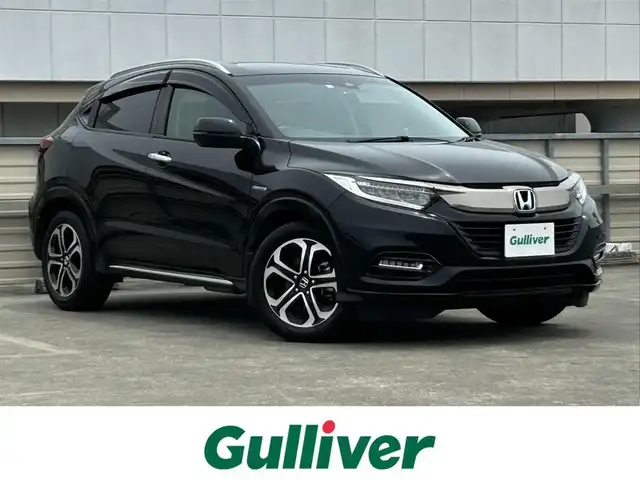 ホンダ ヴェゼル ハイブリッド Z ホンダセンシング 静岡県 2018(平30)年 2.5万km クリスタルブラックパール 純正SDナビ/Bluetooth/バックカメラ/フルセグテレビ/純正ビルトインETC/純正ドライブレコーダー前方のみ/純正フロアマット/純正アルミホイール/パドルシフト/電動パーキングブレーキ/追従式クルーズコントロール/LKAS/横滑り防止装置/衝突軽減システム/LEDヘッドライト/オートライト/フォグランプ