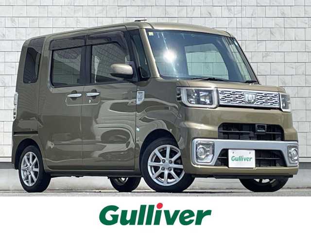 ダイハツ ウェイク X SA 岩手県 2015(平27)年 6.6万km オフビートカーキM 禁煙車/4WD/ターボ/片側パワースライドドア/社外7インチワイドナビ/→フルセグTV/Bluetooth/CD/DVD/FM/AM/バックカメラ/横滑り防止装置/衝突軽減システム/運転席シートヒーター/〇プッシュスタート/〇電動格納ミラー/〇ドアバイザー/〇フロアマット/〇スマートキー/〇シガーソケット/オートライト/LEDヘッドライト/フォグライト/ETC/二列目両側サンシェード/助手席下収納