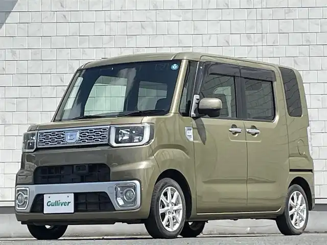 ダイハツ ウェイク X SA 岩手県 2015(平27)年 6.6万km オフビートカーキM 禁煙車/4WD/ターボ/片側パワースライドドア/社外7インチワイドナビ/→フルセグTV/Bluetooth/CD/DVD/FM/AM/バックカメラ/横滑り防止装置/衝突軽減システム/運転席シートヒーター/〇プッシュスタート/〇電動格納ミラー/〇ドアバイザー/〇フロアマット/〇スマートキー/〇シガーソケット/オートライト/LEDヘッドライト/フォグライト/ETC/二列目両側サンシェード/助手席下収納