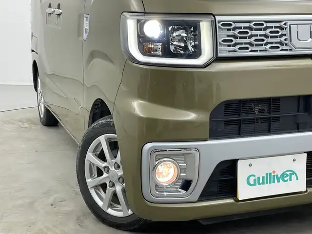 ダイハツ ウェイク X SA 新潟県 2015(平27)年 6.6万km オフビートカーキM 禁煙車/4WD/ターボ/片側パワースライドドア/社外7インチワイドナビ/→フルセグTV/Bluetooth/CD/DVD/FM/AM/バックカメラ/横滑り防止装置/衝突軽減システム/運転席シートヒーター/〇プッシュスタート/〇電動格納ミラー/〇ドアバイザー/〇フロアマット/〇スマートキー/〇シガーソケット/オートライト/LEDヘッドライト/フォグライト/ETC/二列目両側サンシェード/助手席下収納