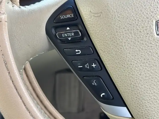 日産 ティアナ 250XL 東京都 2012(平24)年 9.9万km ディープアメジストグレー VDC/TCS/メッキ加飾横３本バーフロントグリル/開口部無塗装１本桟フロントバンパー/ボディ同色電動格納ミラー/ウィンカーミラー/リア標準バンパー/木目調加飾シルキーエクリュインパネ/ファインビジョンメーター（自発光式アナログメーター）/シルキーエクリュ革巻きステアリングホイール/SRSエアバック （運転席/助手席/サイド）/左右独立温度調整オートエアコン/後席エアコン吹出口/シルキーエクリュシート/パワーシート（運転席/助手席）パワーオットマン （助手席）/シート別体上下調整式ヘッドレスト（後席左右中央）/木目調カップホルダー付きアームレスト（後席中央）/インテリジェントキー/イモビライザー/プッシュエンジンスターター/７インチ液晶モニター/スーパーサウンドシステム１（６CD/６スピーカー）/バックモニター
