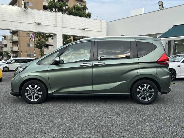 ホンダ フリード クロスター ホンダセンシング 東京都 2020(令2)年 2.2万km シルバーミストグリーンM ワンオーナー/新車時保証書/取扱説明書　ナビ説明書/ホンダセンシング/アイドリングストップ/純正メモリーナビ/フルセグTV【VXM-204VFi】/ドライブレコーダー【HDR360G】/SD/CD/SDREC/DVD/BT/USB/バックカメラ　ETC/両側パワースライドドア/スマートキー×2本/純正15インチアルミ