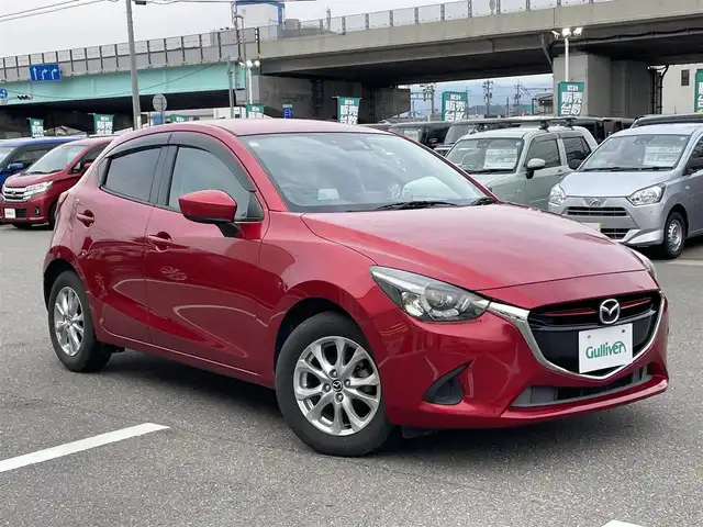 マツダ デミオ 13S Lパッケージ 石川県 2014(平26)年 7.4万km ソウルレッドプレミアムメタリック レーダーブレーキ/純正メモリーナビ/CD/DVD/フルセグTV/バックカメラ/LEDヘッドライト/ETC/ハーフレザーシート/スマートキー/プッシュスタート/電動ミラー/ドライブレコーダー/純正アルミホイール/オートライト