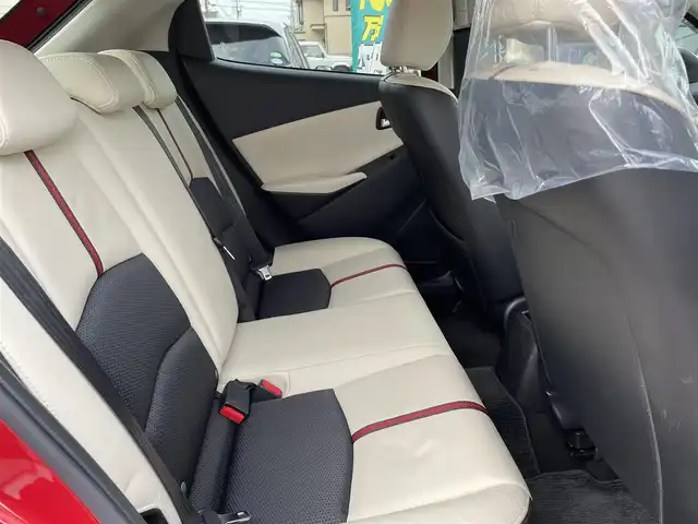 マツダ デミオ 13S Lパッケージ 石川県 2014(平26)年 7.4万km ソウルレッドプレミアムメタリック レーダーブレーキ/純正メモリーナビ/CD/DVD/フルセグTV/バックカメラ/LEDヘッドライト/ETC/ハーフレザーシート/スマートキー/プッシュスタート/電動ミラー/ドライブレコーダー/純正アルミホイール/オートライト