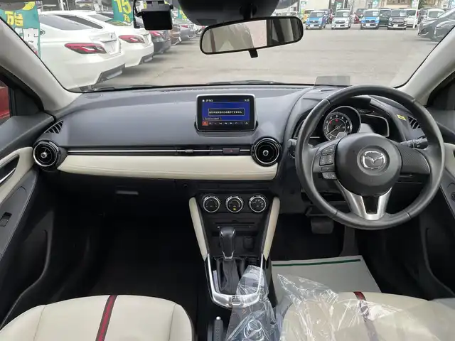 マツダ デミオ 13S Lパッケージ 石川県 2014(平26)年 7.4万km ソウルレッドプレミアムメタリック レーダーブレーキ/純正メモリーナビ/CD/DVD/フルセグTV/バックカメラ/LEDヘッドライト/ETC/ハーフレザーシート/スマートキー/プッシュスタート/電動ミラー/ドライブレコーダー/純正アルミホイール/オートライト