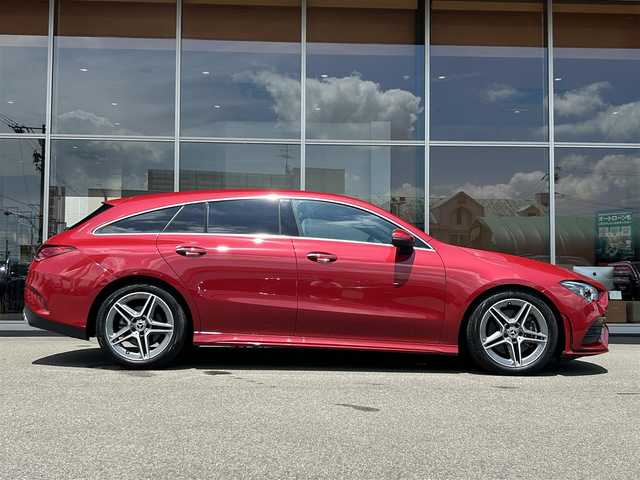 メルセデス・ベンツ Ｍ・ベンツ ＣＬＡ２００ｄ Sブレーク AMGライン 岐阜県 2023(令5)年 1.8万km 赤 パノラミックスライディングルーフ/レーダーセーフティパッケージ/　アクティブブラインドスポットアシスト/　アクティブディスタンスアシストディストロニック/　アクティブステアリングアシスト/　PRE-SAFE/　自動再発進機能/AMGラインパッケージ/　アダプティブハイビームアシスト/　マルチビームLEDヘッドライト/　AMGラインスタイリング/　スポーツブレーキシステム/　ローワードコンフォートサスペンション/　スポーツシート/　本革巻スポーツステアリング/アドバンスドパッケージ/　360°カメラ/　ブランドロゴプロジェクターライト/　ヘッドアップディスプレイ/　MBUXインテリアアシスタント/デジタルコックピットディスプレイ/純正ナビゲーション/フルセグTV/Bluetooth