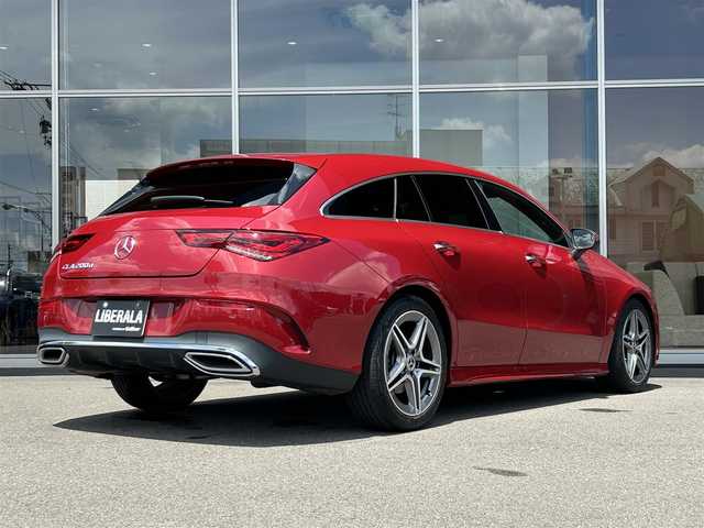 メルセデス・ベンツ Ｍ・ベンツ ＣＬＡ２００ｄ Sブレーク AMGライン 岐阜県 2023(令5)年 1.8万km 赤 パノラミックスライディングルーフ/レーダーセーフティパッケージ/　アクティブブラインドスポットアシスト/　アクティブディスタンスアシストディストロニック/　アクティブステアリングアシスト/　PRE-SAFE/　自動再発進機能/AMGラインパッケージ/　アダプティブハイビームアシスト/　マルチビームLEDヘッドライト/　AMGラインスタイリング/　スポーツブレーキシステム/　ローワードコンフォートサスペンション/　スポーツシート/　本革巻スポーツステアリング/アドバンスドパッケージ/　360°カメラ/　ブランドロゴプロジェクターライト/　ヘッドアップディスプレイ/　MBUXインテリアアシスタント/デジタルコックピットディスプレイ/純正ナビゲーション/フルセグTV/Bluetooth