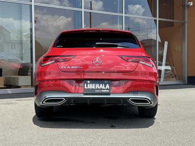 メルセデス・ベンツ Ｍ・ベンツ ＣＬＡ２００ｄ Sブレーク AMGライン 岐阜県 2023(令5)年 1.8万km 赤 パノラミックスライディングルーフ/レーダーセーフティパッケージ/　アクティブブラインドスポットアシスト/　アクティブディスタンスアシストディストロニック/　アクティブステアリングアシスト/　PRE-SAFE/　自動再発進機能/AMGラインパッケージ/　アダプティブハイビームアシスト/　マルチビームLEDヘッドライト/　AMGラインスタイリング/　スポーツブレーキシステム/　ローワードコンフォートサスペンション/　スポーツシート/　本革巻スポーツステアリング/アドバンスドパッケージ/　360°カメラ/　ブランドロゴプロジェクターライト/　ヘッドアップディスプレイ/　MBUXインテリアアシスタント/デジタルコックピットディスプレイ/純正ナビゲーション/フルセグTV/Bluetooth