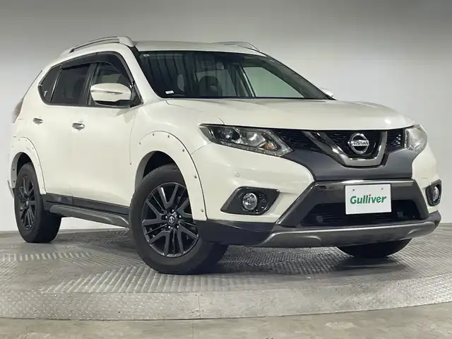 日産 エクストレイル 20X ブラック エクストリーマーX 神奈川県 2015(平27)年 3.9万km ブリリアントホワイトパール ４WD/純正7型SDナビゲーション【MM115D-W】/フルセグ　AM FM CD　USB　Bluetooth iPod/シルバールーフレール/リモコンオートバックドア/エマージェンシーブレーキ/車線逸脱警報/進入禁止警報/フロントリアソナー/ダウンヒルアシストコントロール/アイドリングストップ/合皮シート/革巻きステアリング/ステアリングスイッチ/ビルトインETC/プッシュスタート/スマートキー/純正サイド/リアアンダープロテクター/純正リアスポイラー/純正17インチアルミホイール/社外オーバーフェンダー/LEDヘッドランプ/フロントフォグランプ/オートライト