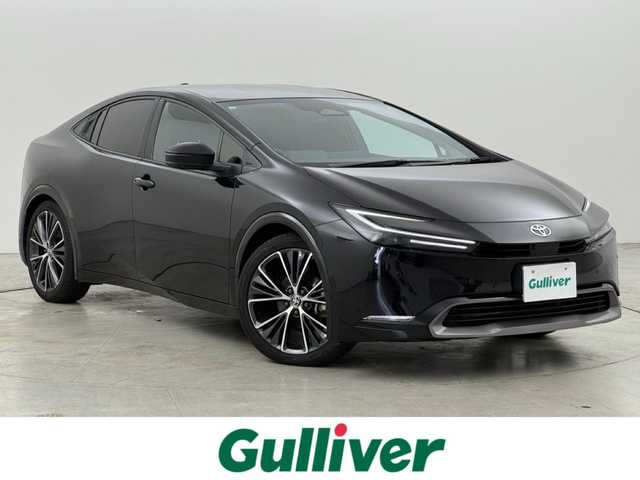 トヨタ プリウス Z 福岡県 2024(令6)年 1.6万km アティチュードブラックマイカ １２．３インチコネクトナビ　/全方位カメラ　/デジタルルームミラー　/ワイヤレス充電　/ビルトインETC２．０　/セーフティセンス　/レーダークルーズコントロール　/コーナーセンサー　/衝突軽減ブレーキ　/レーンキープ　/ブラインドスポットモニター　/アクセル踏み間違い防止　/パーキングアシスト　/シートメモリー付きパワーシート　/シートヒーター/ベンチレーション　/ステアリングヒーター　/パワーバックドア　/純正１９インチアルミホイール　/ＬＥＤヘッドライト