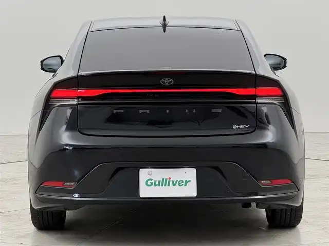 トヨタ プリウス Z 福岡県 2024(令6)年 1.6万km アティチュードブラックマイカ １２．３インチコネクトナビ　/全方位カメラ　/デジタルルームミラー　/ワイヤレス充電　/ビルトインETC２．０　/セーフティセンス　/レーダークルーズコントロール　/コーナーセンサー　/衝突軽減ブレーキ　/レーンキープ　/ブラインドスポットモニター　/アクセル踏み間違い防止　/パーキングアシスト　/シートメモリー付きパワーシート　/シートヒーター/ベンチレーション　/ステアリングヒーター　/パワーバックドア　/純正１９インチアルミホイール　/ＬＥＤヘッドライト