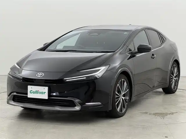 トヨタ プリウス Z 福岡県 2024(令6)年 1.6万km アティチュードブラックマイカ １２．３インチコネクトナビ　/全方位カメラ　/デジタルルームミラー　/ワイヤレス充電　/ビルトインETC２．０　/セーフティセンス　/レーダークルーズコントロール　/コーナーセンサー　/衝突軽減ブレーキ　/レーンキープ　/ブラインドスポットモニター　/アクセル踏み間違い防止　/パーキングアシスト　/シートメモリー付きパワーシート　/シートヒーター/ベンチレーション　/ステアリングヒーター　/パワーバックドア　/純正１９インチアルミホイール　/ＬＥＤヘッドライト