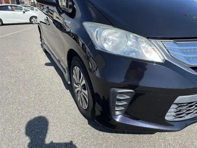 ホンダ フリード ハイブリット ジャストセレクション 石川県 2012(平24)年 8.8万km プレミアムブラキッシュパール 純正9型ナビ/フルセグTV/バックカメラ/HIDヘッドライト/ETC/両側パワースライドドア/スマートキー/電動ミラー/ハーフレザーシート/オートエアコン/オートライト