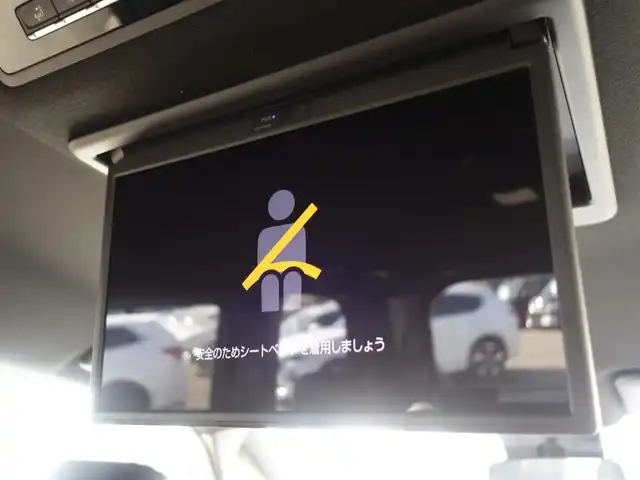 トヨタ ヴォクシー ハイブリッド S－Z 山形県 2024(令6)年 0.5万km ホワイトパールクリスタルシャイン トヨタセーフティセンス/純正フリップダウンモニター (V13T-R72R)/純正ディスプレイオーディオ/　　【BT USB AM/FM Miracast】/バックカメラ/両側パワースライドドア/レーダークルーズコントロール/LEDオートヘッドライト/ハーフレザーシート/シートヒーター/純正17インチアルミホイール/コーナーセンサー/アイドリングストップ/ステアリングスイッチ/電動格納ウィンカーミラー/BSM/フロアマット/スマートキー/ETC2.0