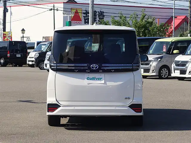 トヨタ ヴォクシー ハイブリッド S－Z 山形県 2024(令6)年 0.5万km ホワイトパールクリスタルシャイン トヨタセーフティセンス/純正フリップダウンモニター (V13T-R72R)/純正ディスプレイオーディオ/　　【BT USB AM/FM Miracast】/バックカメラ/両側パワースライドドア/レーダークルーズコントロール/LEDオートヘッドライト/ハーフレザーシート/シートヒーター/純正17インチアルミホイール/コーナーセンサー/アイドリングストップ/ステアリングスイッチ/電動格納ウィンカーミラー/BSM/フロアマット/スマートキー/ETC2.0