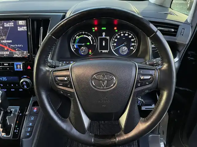 トヨタ ヴェルファイア ハイブリット ZR Gエディション 宮城県 2017(平29)年 5.6万km ブラック モデリスタエアロ（F、S、R）/レーダークルーズコントロール/コーナーセンサー/アルパイン後席フリップダウン式モニター/アルパインパワーサブウーハー/アルパインナビ（フルセグTV、SD、DVD、CD、BT）/アルパインカーアロマ/３列シート/レザーシート/パワーシート/（運転席、助手席、2列目後席シート）/ケンウッドETC２．０/コムテックテレビユーティリティー/オートライト/ドアバイザー/AC１００V/ステアリングヒーター/パーキングホールド/両側パワースライドドア/パワーバックドア/社外アルミ夏タイヤ/(235/50R18)/PWRドア切り替え/ECOモード/横滑り防止/純正スタートスターター×１/純正ステップライト/スマートキー×２/シートポジションスイッチ(運転席)