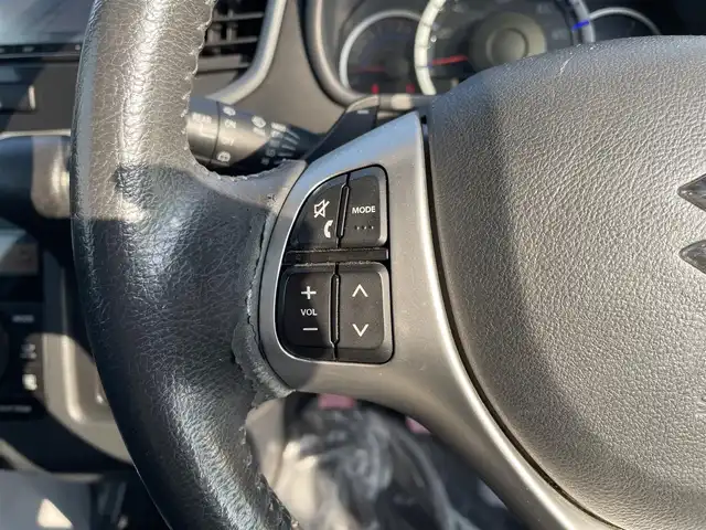 スズキ ワゴンＲ スティングレー T 佐賀県 2013(平25)年 12.6万km ブルーイッシュブラックパール3 社外SDナビゲーション/・フルセグTV/CD/DVD/SD/Bluetooth/アイドリングストップ/ISOFIX対応/パドルシフト/革巻きステアリング/ステアリングリモコン/純正15インチアルミホイール/純正キセノンヘッドライト/純正LEDフォグランプ/純正フロアマット/新車保証書/取扱説明書/スペアキー１本