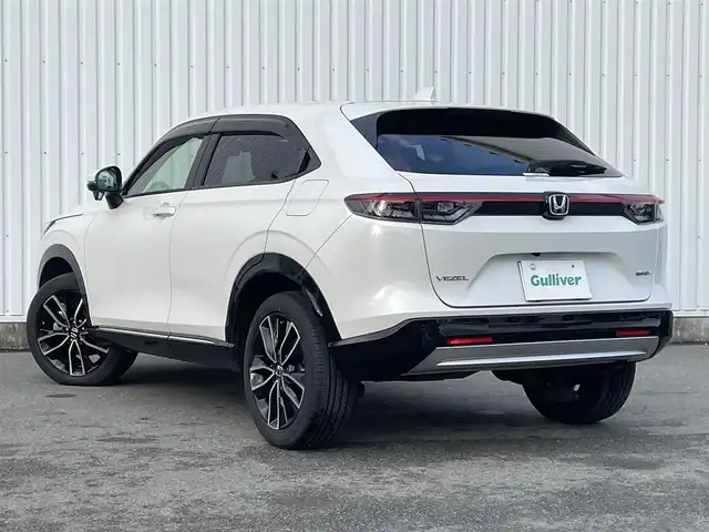 ホンダ ヴェゼル ハイブリッド e:HEV Z 福岡県 2021(令3)年 2.9万km パール ・ホンダコネクトディスプレー /・ホンダセンシング ACC/LDA/CMBS /・BSM  /・Bカメラ /・D/N席シートヒーター /・ステアリングヒーター /・ワイヤレス充電 /・パワーバックドア /・パドルシフト /・ドライブモードセレクト/・電格ミラー/・スマートキー/プッシュスタート/・ETC2.0