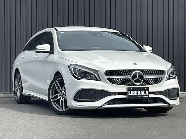メルセデス・ベンツ ＣＬＡ１８０ Sブレイク AMG スタイル 福島県 2018(平30)年 5.1万km ポーラホワイト アダプティブクルーズコントロール/ブラインドスポットモニター/ハーフレザーシート(ブラック)/シートヒーター(前席)/純正ナビ(BT/USB/CD/DVD)/フルセグTV/バックカメラ/純正18AW/LEDオートハイビーム/ETC/ドライブレコーダー(前方のみ)/パドルシフト/アンビエントライト/純正フロアマット/取扱説明書/保証書/スペアキー