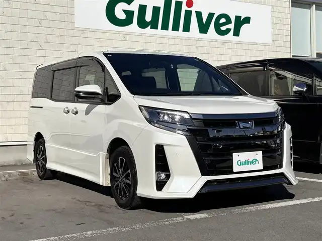 トヨタ ノア Si ダブルバイビーⅡ 静岡県 2019(令1)年 4.3万km ホワイトパールクリスタルシャイン ワンオーナー/禁煙車/純正7インチナビ/（CD/DVD/AM/FM/BT）/・バックカメラ/・フルセグTV/トヨタセーフティセンス/・プリクラッシュセーフティ/・クルーズコントロール/・レーンディパーチャーアラート/・クリアランスソナー/・オートハイビーム/両側パワースライドドア/ETC/前方ドライブレコーダー/純正アルミホイール積込み/ハーフレザーシート/純正フロアマット/ドアバイザー