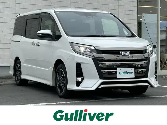 トヨタ ノア Si ダブルバイビーⅡ 静岡県 2019(令1)年 4.3万km ホワイトパールクリスタルシャイン ワンオーナー/禁煙車/純正7インチナビ/（CD/DVD/AM/FM/BT）/・バックカメラ/・フルセグTV/トヨタセーフティセンス/・プリクラッシュセーフティ/・クルーズコントロール/・レーンディパーチャーアラート/・クリアランスソナー/・オートハイビーム/両側パワースライドドア/ETC/前方ドライブレコーダー/純正アルミホイールサマータイヤ/社外AWスタッドレス車載/ハーフレザーシート/純正フロアマット/ドアバイザー