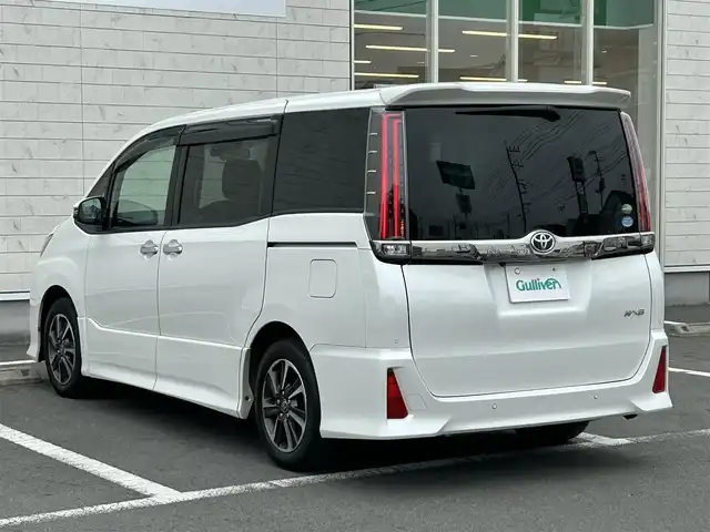 トヨタ ノア Si ダブルバイビーⅡ 静岡県 2019(令1)年 4.3万km ホワイトパールクリスタルシャイン ワンオーナー/禁煙車/純正7インチナビ/（CD/DVD/AM/FM/BT）/・バックカメラ/・フルセグTV/トヨタセーフティセンス/・プリクラッシュセーフティ/・クルーズコントロール/・レーンディパーチャーアラート/・クリアランスソナー/・オートハイビーム/両側パワースライドドア/ETC/前方ドライブレコーダー/純正アルミホイールサマータイヤ/社外AWスタッドレス車載/ハーフレザーシート/純正フロアマット/ドアバイザー