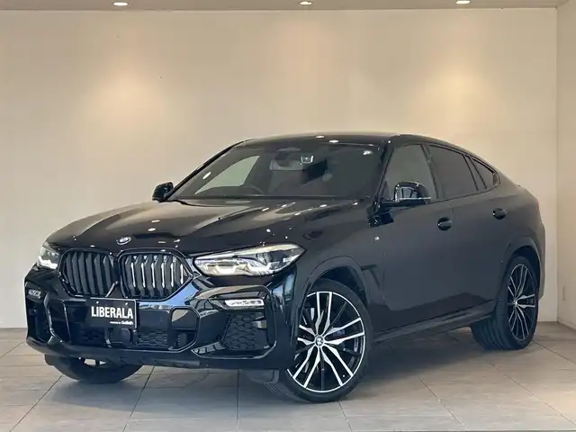 ＢＭＷ Ｘ６ xDrive35d 愛知県 2020(令2)年 6万km サファイアブラックP ワンオーナー/純正ナビ/フルセグテレビ/360°カメラ/アイドリングストップ/ウィンカーミラー/プッシュスタート/パワーバックドア/ETC/赤革/全席シートヒーター/ヘッドアップディスプレイ/プラスパッケージ/ソフトクローズドア/純正２２インチアルミ/前後純正ドラレコ