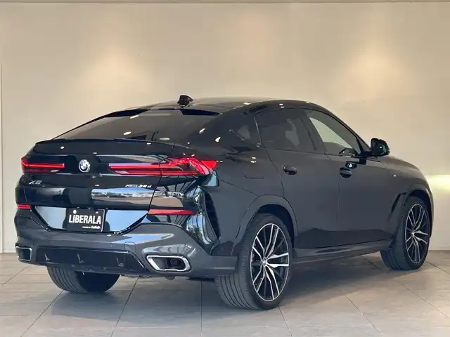 ＢＭＷ Ｘ６ xDrive35d 愛知県 2020(令2)年 6万km サファイアブラックP ワンオーナー/純正ナビ/フルセグテレビ/360°カメラ/アイドリングストップ/ウィンカーミラー/プッシュスタート/パワーバックドア/ETC/赤革/全席シートヒーター/ヘッドアップディスプレイ/プラスパッケージ/ソフトクローズドア/純正２２インチアルミ/前後純正ドラレコ