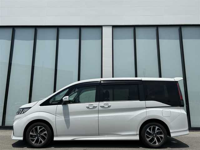 ホンダ ステップワゴン スパーダ ホンダセンシング 大阪府 2021(令3)年 2.2万km プラチナホワイトパール 純正９インチナビ/   フルセグTV/CD/DVD/Bluetooth/USB/バックモニター/衝突軽減ブレーキ/横滑り防止装置/両側パワースライドドア/レーダークルーズコントロール/レーンキープアシスト/パドルシフト/ドライブレコーダー/純正16インチアルミホイール/純正フロアマット/プッシュスタート/スマートキー/ＥＴＣ/ＬＥＤ