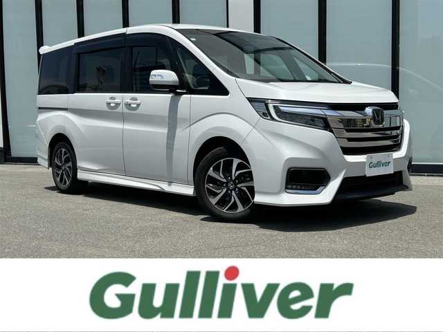 ホンダ ステップワゴン スパーダ ホンダセンシング 大阪府 2021(令3)年 2.2万km プラチナホワイトパール 純正９インチナビ/   フルセグTV/CD/DVD/Bluetooth/USB/バックモニター/衝突軽減ブレーキ/横滑り防止装置/両側パワースライドドア/レーダークルーズコントロール/レーンキープアシスト/パドルシフト/ドライブレコーダー/純正16インチアルミホイール/純正フロアマット/プッシュスタート/スマートキー/ＥＴＣ/ＬＥＤ