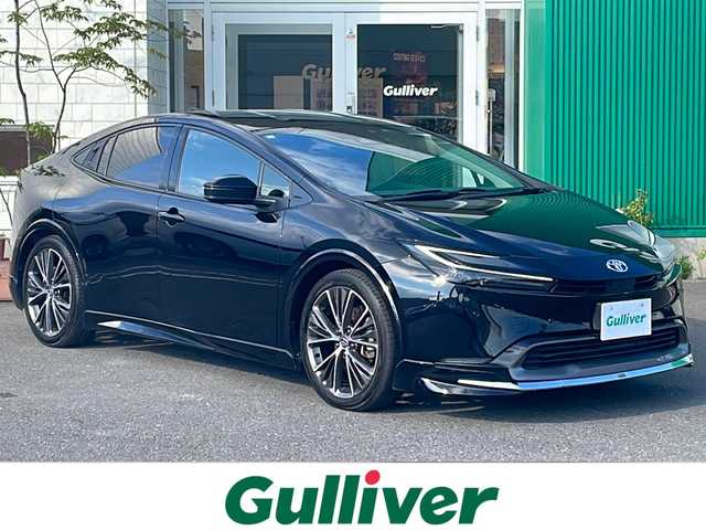 トヨタ プリウス Z 青森県 2023(令5)年 2.6万km アティチュードブラックマイカ 4WD/純正12.3インチディスプレイオーディオ・フルセグ/パノラミックビューモニター/合皮スポーツシート/前席エアシート・シートヒーター/運転席メモリー付パワーシート/ステアリングヒーター/パワーバックドア/セーフティセンス/プリクラッシュセーフティ/レーダークルーズコントロール/レーントレーシングアシスト/レーンディパーチャーアラート/オートマチックハイビーム/ブラインドスポットモニター/トヨタチームメイト/ワイヤレス充電/前後ドライブレコーダー/AC100V1500W電源/ワイパーデアイサー/ビルトインETC2.0/LEDヘッドライト/LEDアクセサリーランプ/リアフォグランプ/純正19インチアルミ/前後モデリスタエアロ