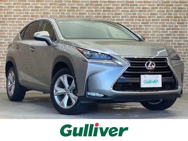 レクサス ＮＸ 300h バージョンL 岩手県 2015(平27)年 9.2万km ソニックチタニウム ワンオーナー/４WD/三眼フルLEDヘッドランプ/ムーンルーフ/本革シート/マークレビンソンプレミアムサラウンドサウンドシステム/パワーバックドア/電動格納・リクライニングリヤシート/クルーズコントロール/クリアランスソナー/オートブレーキホールド/パドルシフト/パワーシート/シートヒーター/シートベンチレーション/ステアリングヒーター/AC100V100Wアクセサリーコンセント/純正ナビ/フルセグTV/TVキャンセラー/Blu-rayDisc再生機能/ETC2.0/ドライブレコーダー/バックカメラ・サイドカメラ/純正18インチアルミホイール