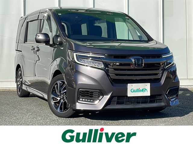 ホンダ ステップワゴン スパーダ クルスピセンシング 福岡県 2020(令2)年 2.6万km モダンスティールM ・純正10インチナビ【VXU-217SWi】/-BT/フルセグTV/CD/DVD/FM/AM/AppleCarPlay/・バックカメラ/・純正フリップダウンモニター【VM-185EN】/・両側パワースライドドア/・レーダークルーズコントロール/・衝突軽減ブレーキ/・車線逸脱警報/・パドルシフト/・前後ドライブレコーダー/・前席シートヒーター/・サンシェード/・ETC2.0/・純正フロアマット/・純正アルミ17インチ/・ドアバイザー/・リアエアコン/・アイドリングストップ/・シートテーブル/・ステアリングリモコン/・プッシュスタート/・スマートキー/・スペアキー